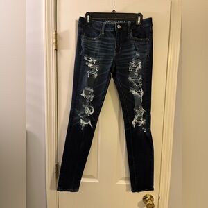 American Eagle, 360 super stretch jegging, ripped front, size 10